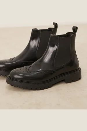 ASOS Botas Chelsea negras con suela gruesa de cuero bruñido de
