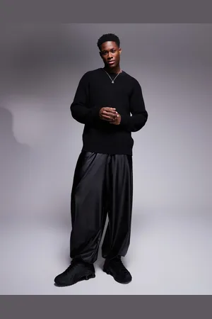 ASOS Joggers negros de corte globo holgado de tejido efecto cuero de