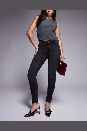 River Island Vaqueros negros de corte pitillo de