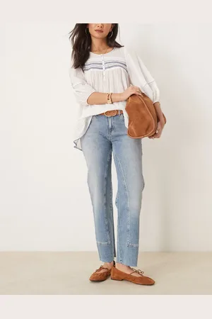 Free People Vaqueros azules de pernera recta y talle medio con lavado medio Risk Taker de