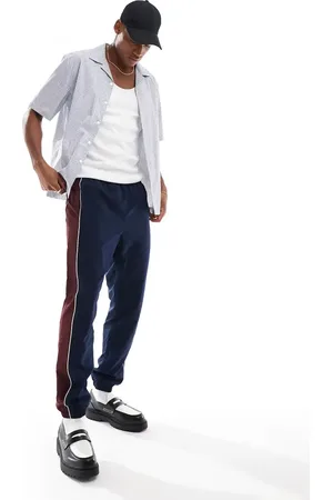 Lacoste Pantalones de chándal con diseño color block de
