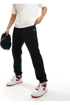 Ellesse Joggers negros con ribetes en la cinturilla Guliana de
