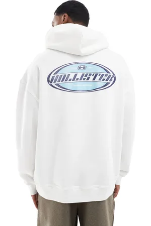 Hollister Sudadera blanca holgada con estampado de estilo años 90 en la espalda de