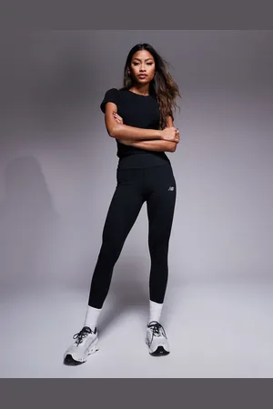 New Balance Leggings negros de talle alto de