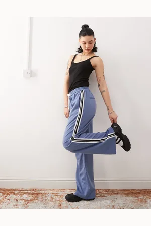 Noisy May Pantalones azules de pernera ancha con rayas laterales de