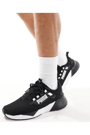 PUMA Zapatillas de deporte negras y blancas Retaliate 3 de