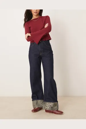 ASOS Vaqueros añil con dobladillos vueltos con estampado de leopardo de