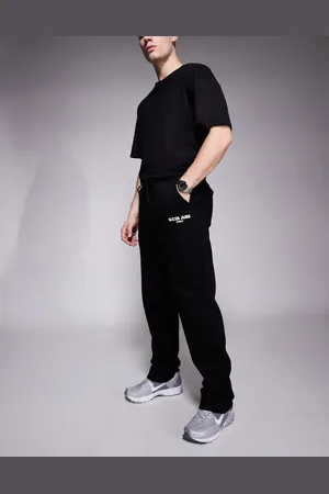 Sixth June Joggers negros de pernera recta con detalle estampado de