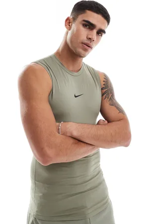 Nike Camiseta ajustada sin mangas Dri-FIT de -Verde