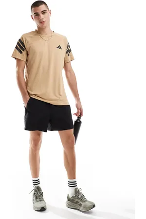 adidas Camiseta color piedra con detalle de 3 rayas Essentials Gym+ de adidas Training-Neutro