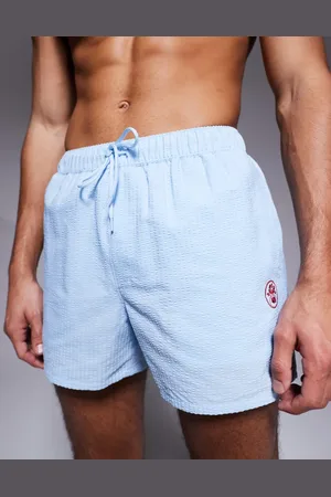 ASOS Shorts de baño cortos con detalle bordado de sirsaca de