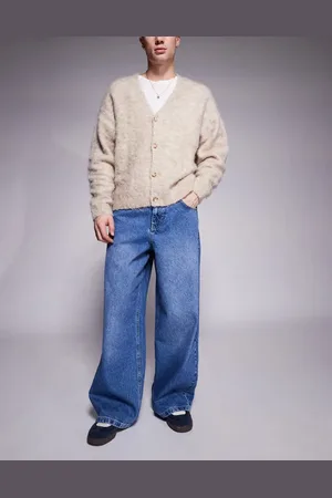 ASOS Vaqueros muy holgados con lavado azul medio y estampado trasero de