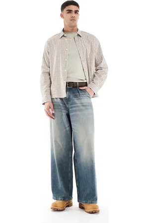 ASOS Vaqueros muy holgados con lavado azul oscuro de