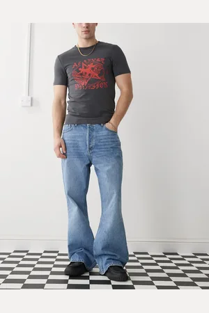 Dr Denim Vaqueros azules de corte bootcut holgado con lavado medio envejecido Rift de