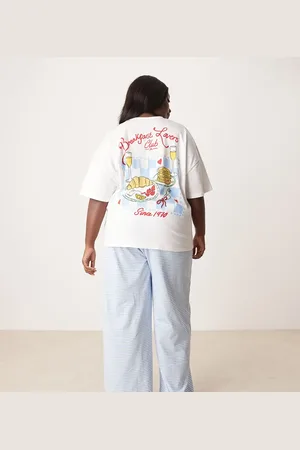 ASOS Pijama de camiseta extragrande y pantalones de pernera ancha con estampado "Breakfast Lovers" de ASOS DESIGN Curve