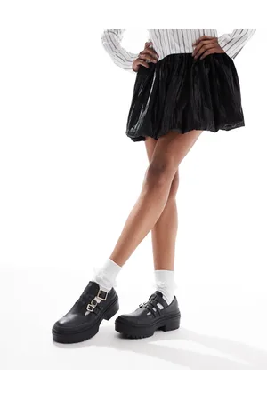 Converse Merceditas negras con plataforma Chuck Taylor All Star de