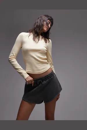 Topshop Camiseta amarillo lavado de manga larga con bajo redondeado de canalé de