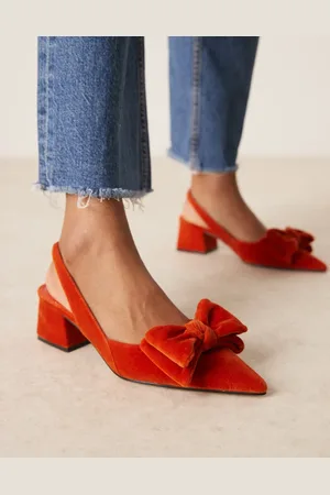 ASOS Zapatos color óxido destalonados de tacón medio grueso con detalle de lazo de terciopelo Symphony de -Naranja