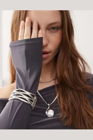 Reclaimed Pulsera plateada rígida sin cierres con diseño ondulado de