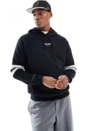 Hollister Sudadera negra de corte cuadrado con capucha y logo universitario de