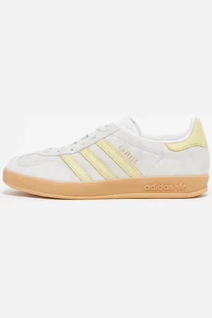 adidas Zapatillas de deporte plateadas y amarillas Gazelle Indoor de