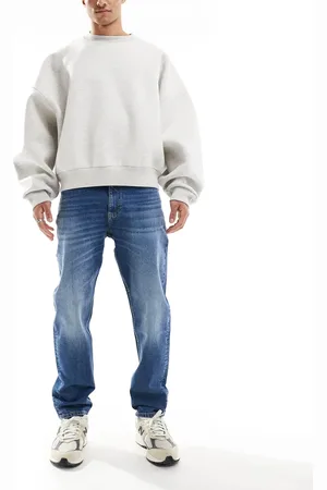 Tommy Hilfiger Vaqueros con lavado oscuro de corte tapered holgado Isaac de -Azul