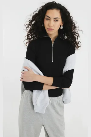 River Island Top de manga larga con cremallera delantera de canalé de