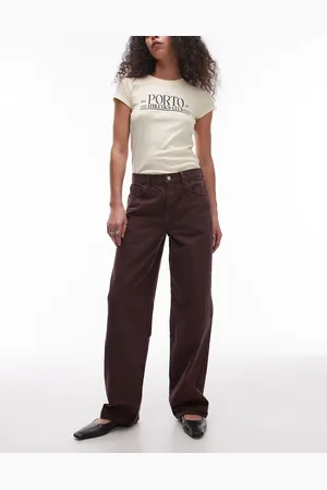 Topshop Vaqueros marrones de talle bajo y corte holgado con detalle regulable de