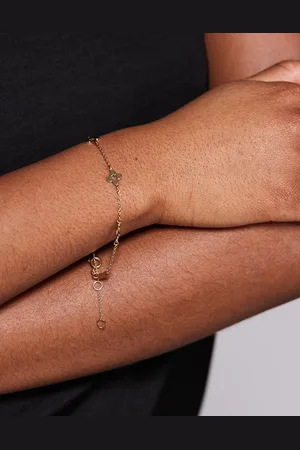 Aldo Pulsera con charms de flores chapada en oro Elbelia de
