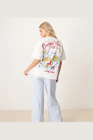 ASOS Pijama de camiseta extragrande y pantalones de pernera ancha con estampado "Breakfast Lovers" de ASOS DESIGN Petite
