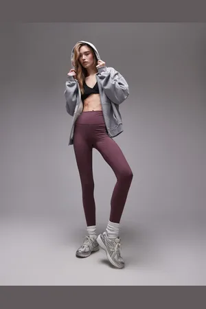 New Balance Leggings color ciruela de talle alto de -Morado