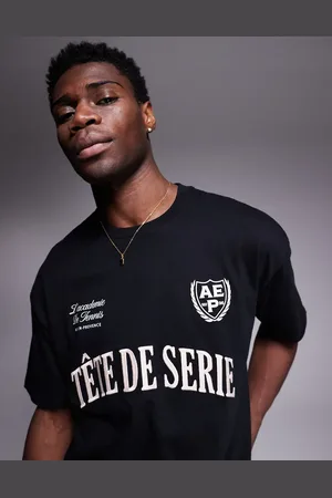 ASOS Camiseta negra extragrande con texto deportivo bordado de