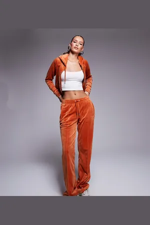 Juicy Couture Joggers color óxido de pernera recta de velour exclusivos en ASOS de (parte de un conjunto)-Naranja