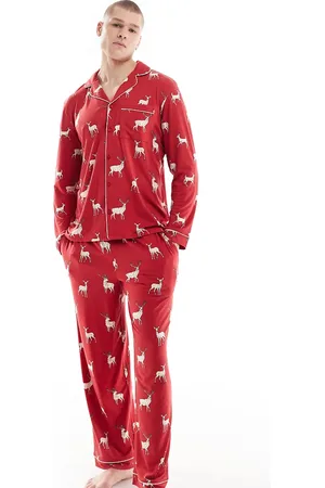 Chelsea Peers Pijama de pantalones y camisa de manga larga con solapas y estampado de renos de Navidad His & Hers exclusivo de