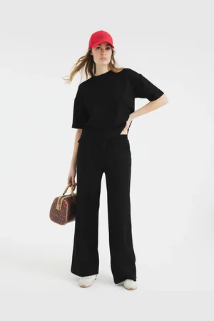 River Island Joggers negros de pernera ancha y corte depurado de