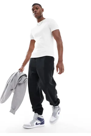 ASOS Joggers negros extragrandes de felpa de