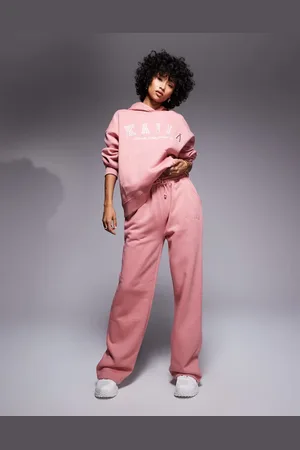 Kaiia Joggers rosas de pernera ancha con logo bordado de (parte de un conjunto)