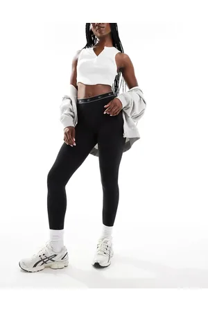 Lacoste Leggings negros con logo de