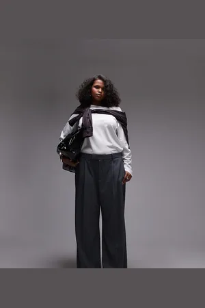 MANGO Pantalones grises de pernera ancha con pinzas delanteras de Curve
