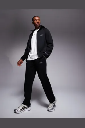 Nicce London Joggers negros con logo de (parte de un conjunto)