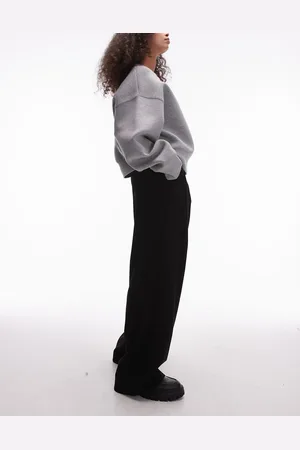 MANGO Pantalones negros holgados con pinzas delanteras de