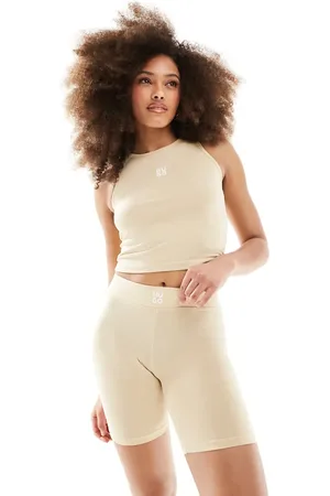 HUGO BOSS Leggings cortos con logo Suki de HUGO Bodywear- neutro
