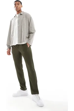 River Island Pantalones caquis plisados de -Verde