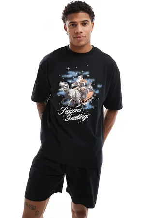 ASOS Pijama con estampado navideño de trineo con dinosaurio de