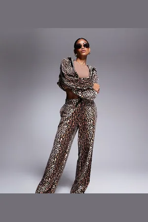 Juicy Couture Joggers de pernera ancha con estampado de de velour exclusivos en ASOS de -Marrón