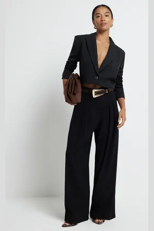 River Island Pantalones negros de pernera ancha con pinzas de
