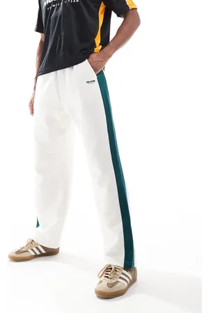 Hollister Joggers color holgados con banda lateral de estilo universitario de -Neutro
