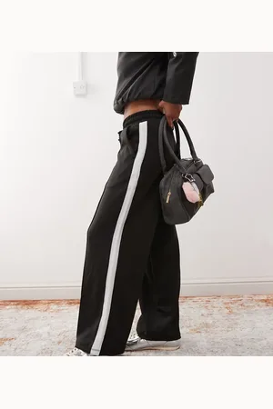 Noisy May Joggers negros de pernera ancha con banda lateral de