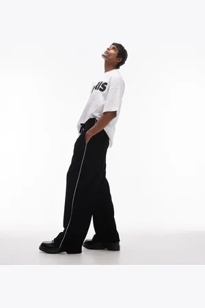 Topman Joggers negros de pernera holgada con ribete en los laterales de