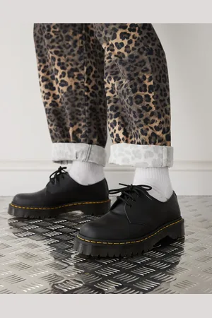 Dr. Martens Zapatos negros con 3 pares de ojales y suela Bex de cuero liso 1461 de Dr. Martens